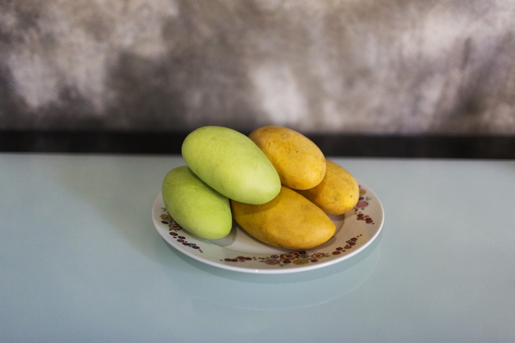 Mangoes on the kitchen table of Yolanda Alcantara, Batangas City, Philippines.