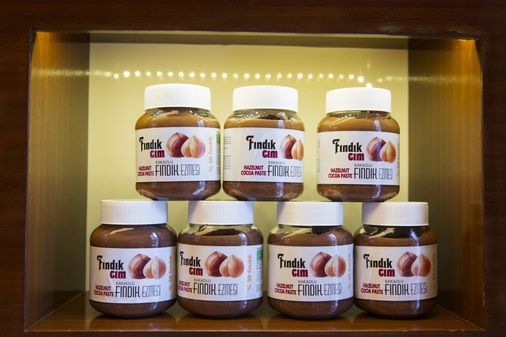 Jars of hazelnut paste on a shelf at the Findik Evi Black Sea Chocolate Shop, Giresun, Turkey.